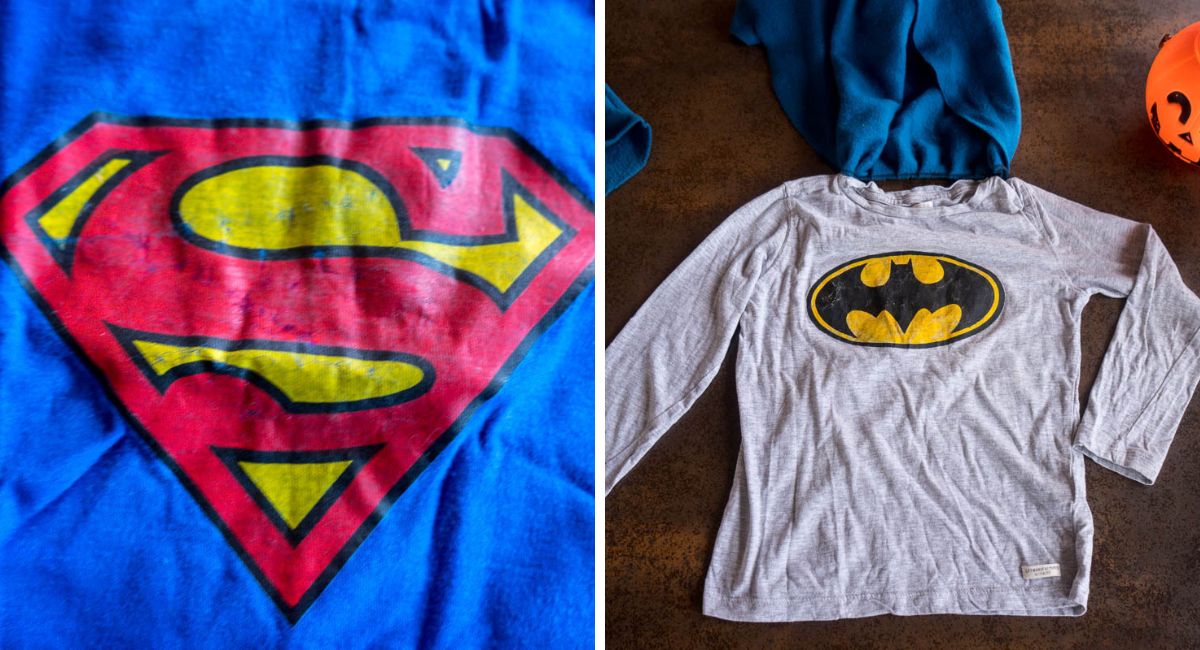 Camisetas caseras de Superman y Batman con sus logotipos, uno realizado con papel transfer y otro pintado sobre la tela con una plantilla.